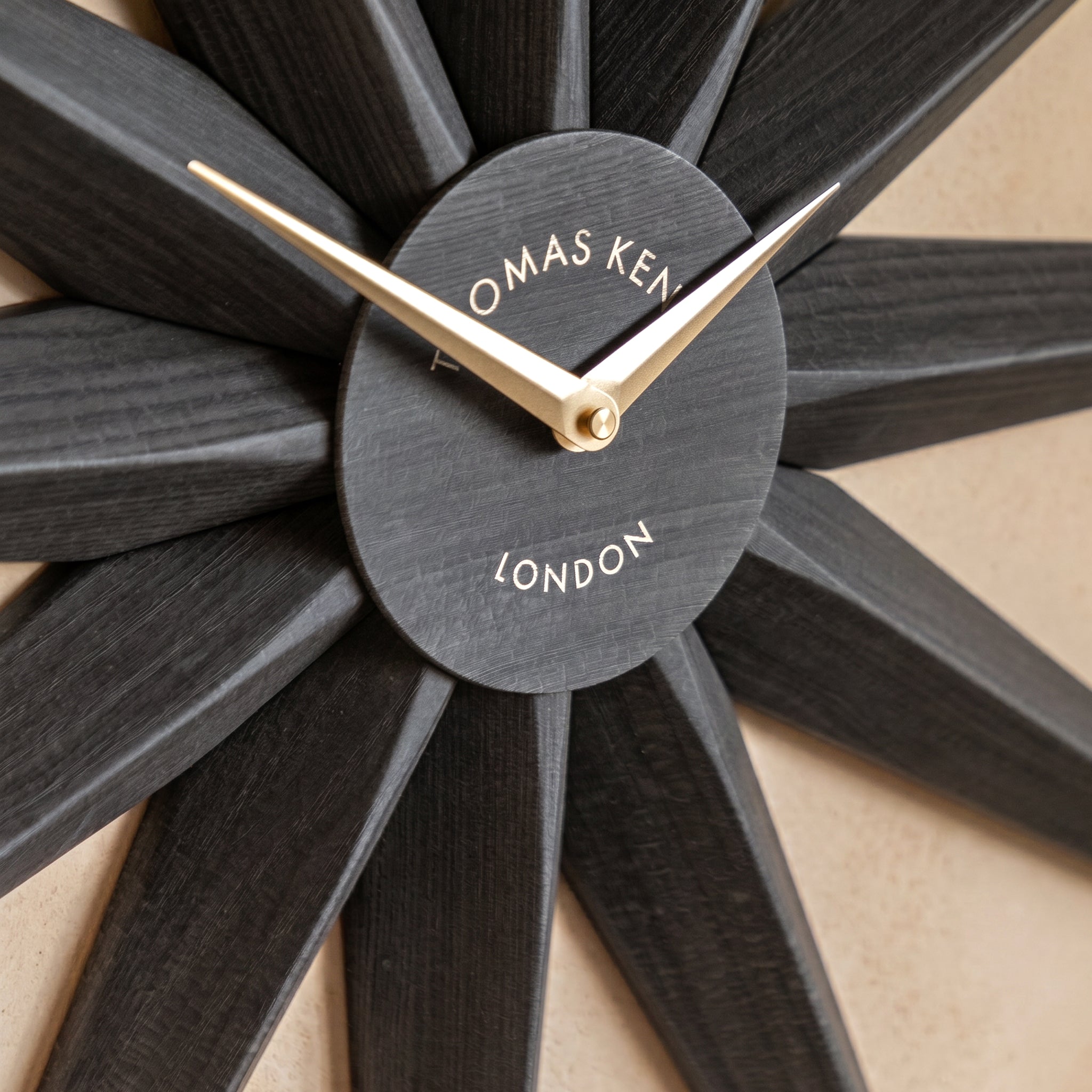 Dark Wood Effect 'Thomas Kent London' branding on a beige background